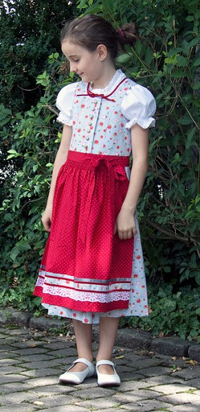 Hübsches Kinderdirndl in hellem grau mit roten Streublumen und roter Schürze, Trachtn Bäda